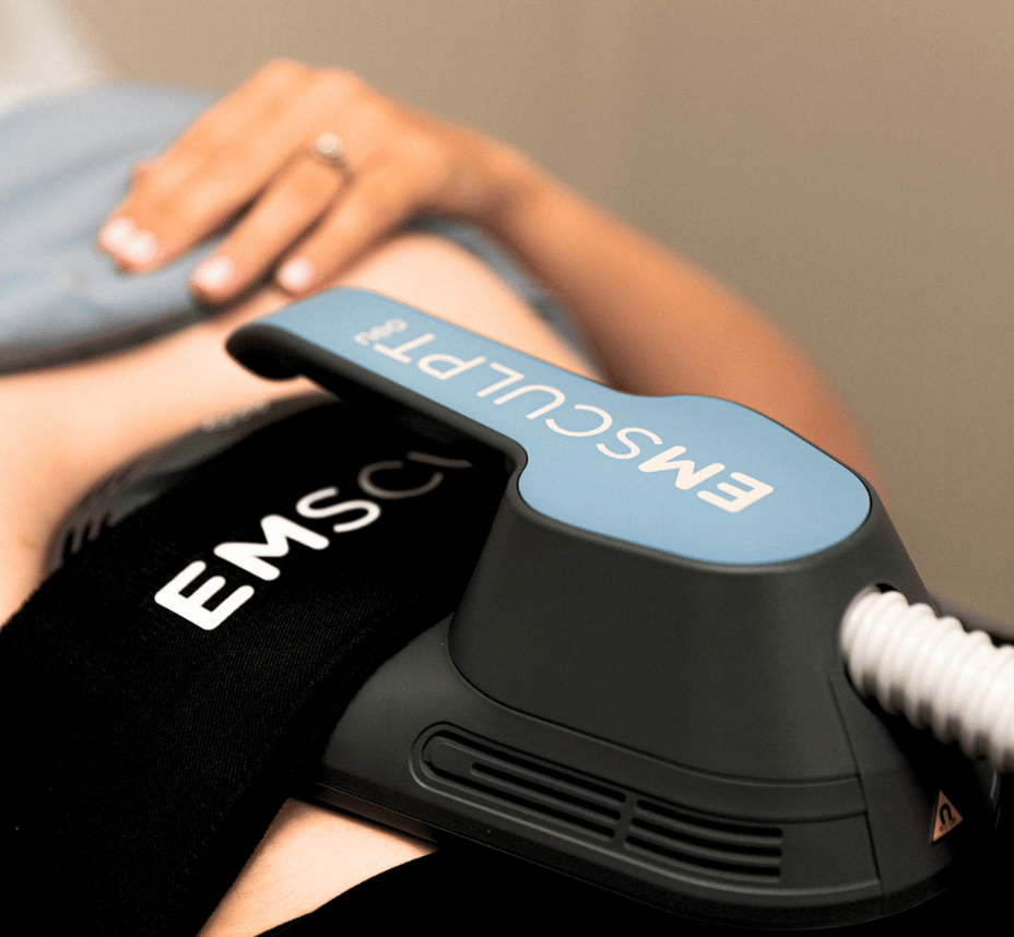 Patient receives an EMSCULPT NEO treatment on her abdomen.