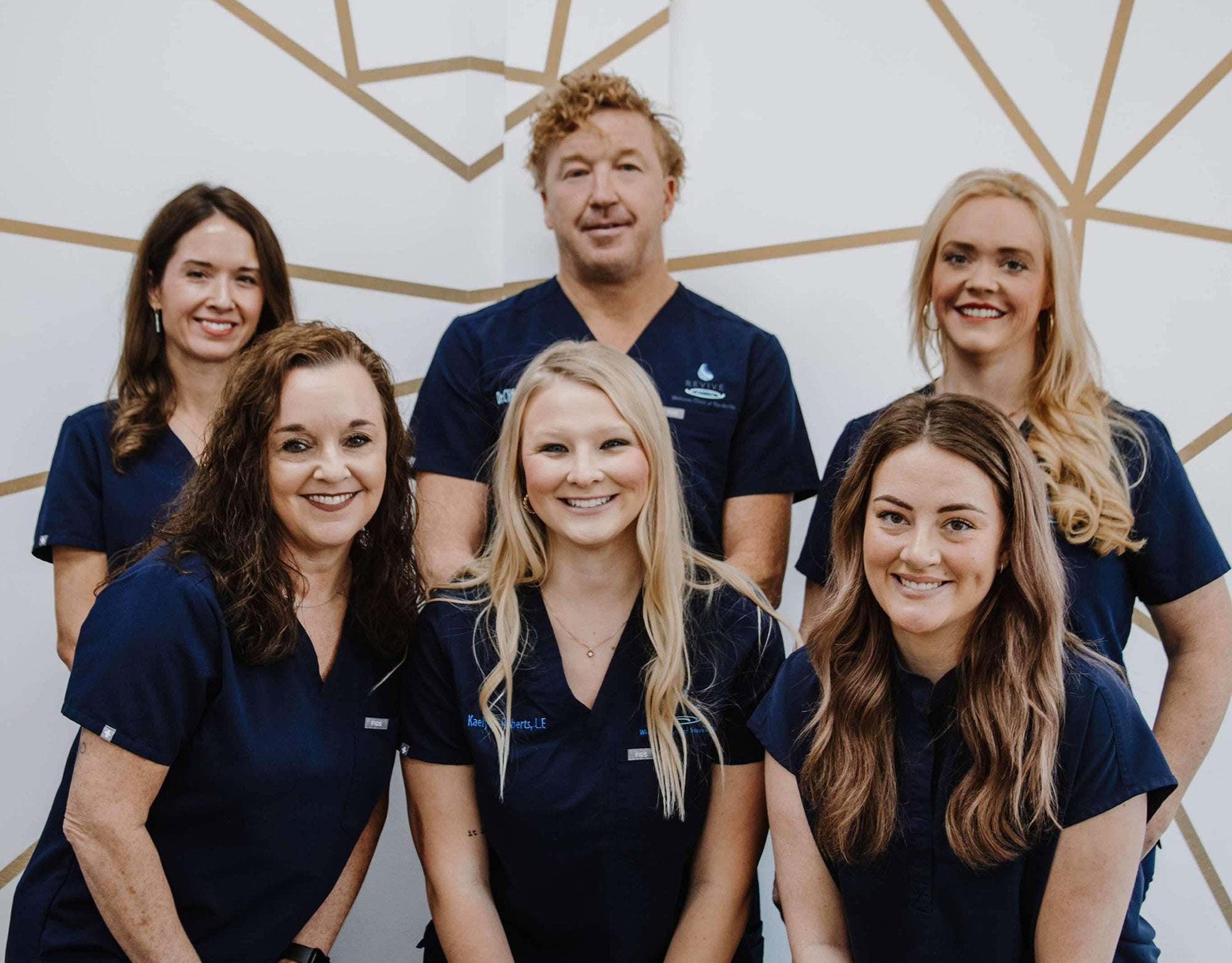 Revive Wellness team at the Starkville, Mississippi clinic, providing Botox, medical aesthetics, hormone replacement therapy, IV therapy, skincare, and wellness services.