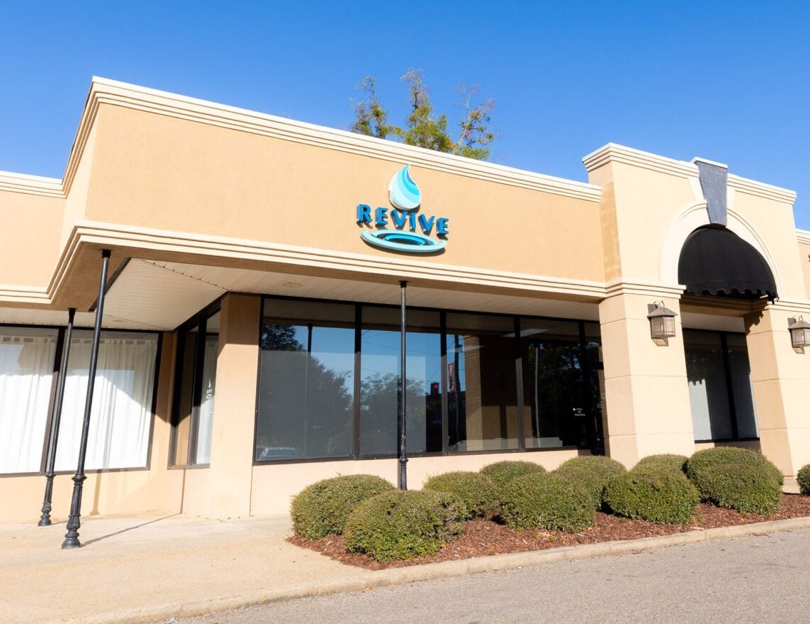 Exterior of the Revive Wellness medical spa and wellness clinic in Starkville, Mississippi, offering aesthetic treatments, hormone therapy, IV therapy, and skincare services.