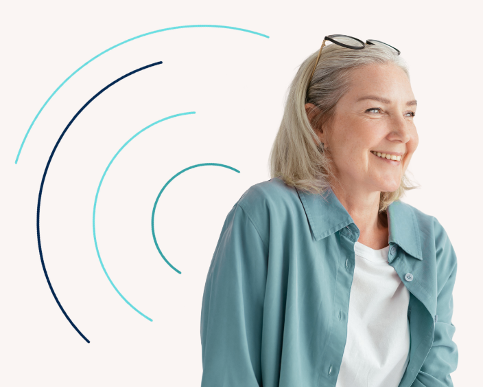 Smiling woman in a blue shirt with teal flowing lines creating a wave pattern around her.